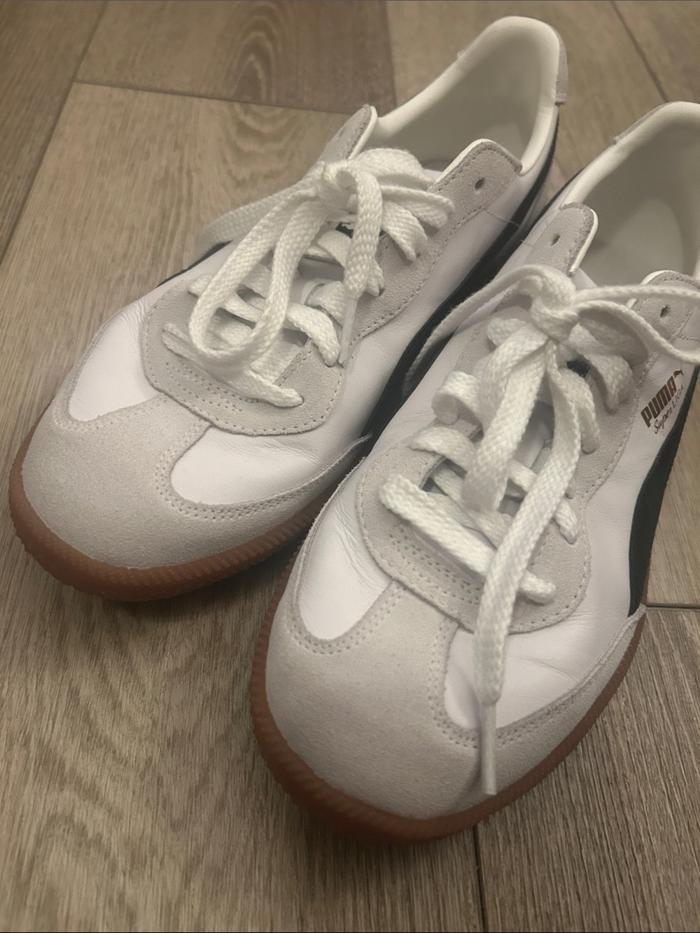 Puma White and Black Super Liga Sneakers with Gum Sole